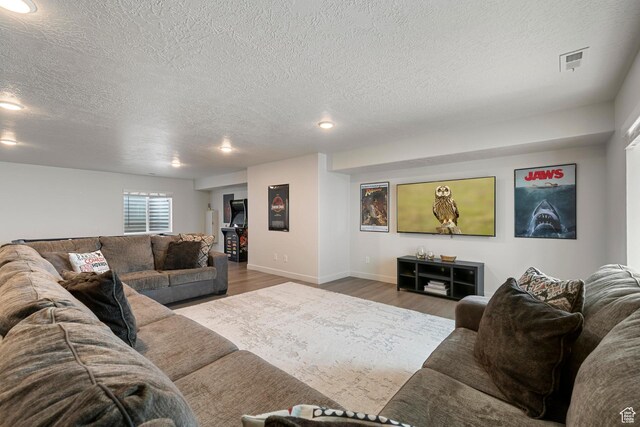6691 Woods Rose Dr Unit 45, Park City, UT 84098 - living room with a textured ceiling, wood finished floors, and recessed lighting