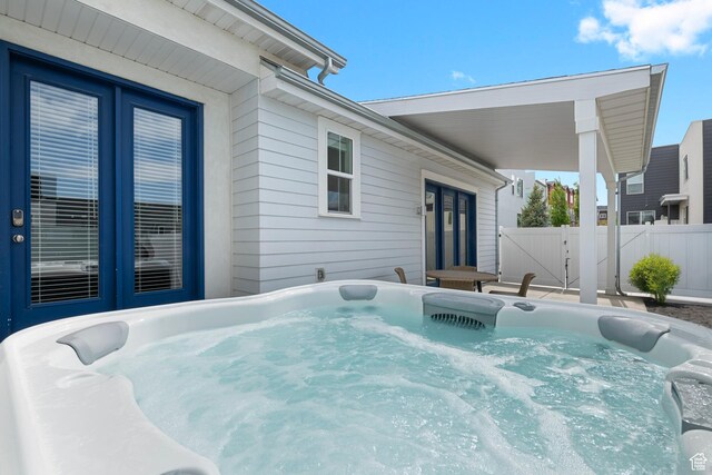 6691 Woods Rose Dr Unit 45, Park City, UT 84098 - view of patio with a hot tub and french doors