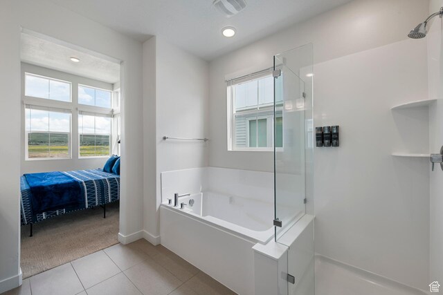 6691 Woods Rose Dr Unit 45, Park City, UT 84098 - bathroom featuring ensuite bathroom, a garden tub, a walk in shower, and tile patterned floors