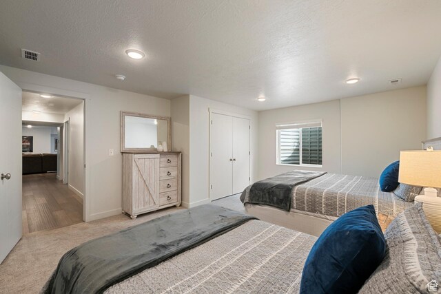 6691 Woods Rose Dr Unit 45, Park City, UT 84098 - bedroom with carpet floors, a textured ceiling, and recessed lighting
