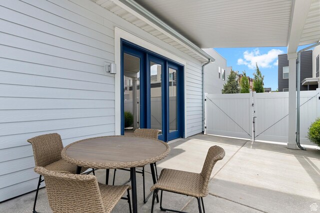 6691 Woods Rose Dr Unit 45, Park City, UT 84098 - view of patio / terrace with a gate and outdoor dining space