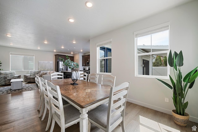 6691 Woods Rose Dr Unit 45, Park City, UT 84098 - dining room featuring wood finished floors and recessed lighting
