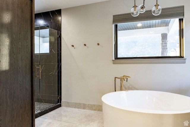 1621 E Box Elder Cir, Alpine, UT 84004 - bathroom with a freestanding tub, a stall shower, and tile patterned flooring