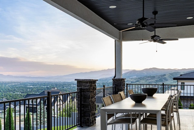 1621 E Box Elder Cir, Alpine, UT 84004 - patio / terrace with a mountain view, a ceiling fan, and outdoor dining space