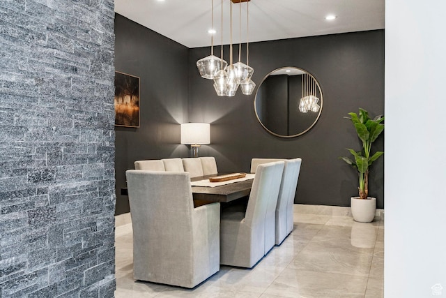 1621 E Box Elder Cir, Alpine, UT 84004 - dining room featuring a chandelier, marble finish floors, recessed lighting, and an accent wall