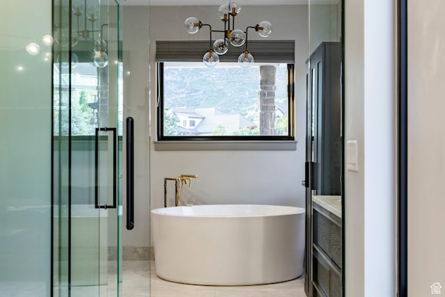 1621 E Box Elder Cir, Alpine, UT 84004 - bathroom featuring a stall shower, a freestanding bath, a chandelier, and vanity