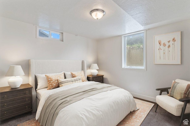 1393 E Davis Ave, Logan, UT 84321 - bedroom with a textured ceiling and baseboards