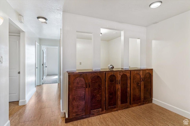 1393 E Davis Ave, Logan, UT 84321 - bar area featuring baseboards and light wood-style floors
