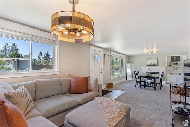 1393 E Davis Ave, Logan, UT 84321 - living room with a chandelier and carpet flooring