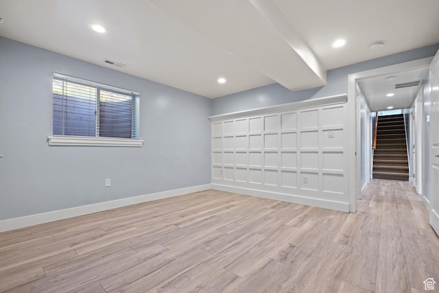 9096 N Canyon Rd, Cedar Hills, UT 84062 - empty room with stairway, light wood-style floors, recessed lighting, and a smoke detector