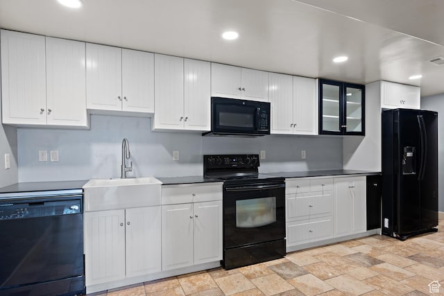 9096 N Canyon Rd, Cedar Hills, UT 84062 - kitchen with black appliances, light stone finish flooring, white cabinets, and recessed lighting