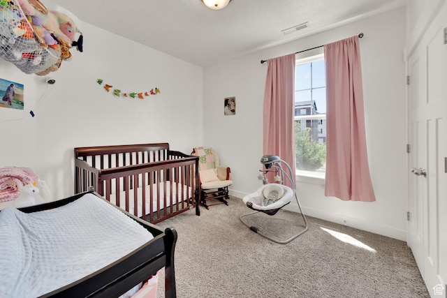 3811 W 1530 N Unit 202, Lehi, UT 84043 - bedroom featuring carpet floors and a crib