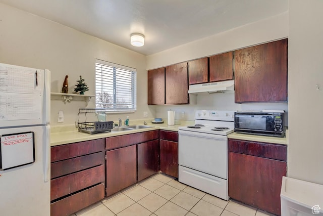 41 S 200 E, Santaquin, UT 84655 - kitchen with white appliances, under cabinet range hood, light countertops, and light tile patterned floors