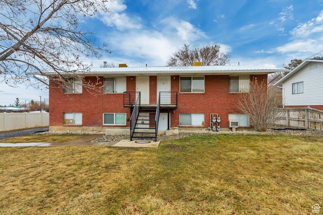 41 S 200 E, Santaquin, UT 84655 - rear view of property with brick siding, a chimney, and a metal roof