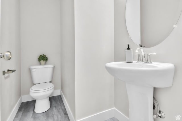 797 S Cowans Ct, Clearfield, UT 84015 - bathroom featuring toilet and wood finished floors
