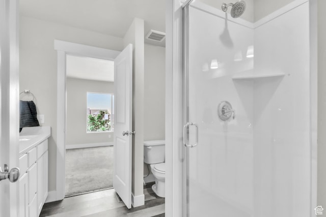 797 S Cowans Ct, Clearfield, UT 84015 - bathroom with a shower stall, wood finished floors, and vanity