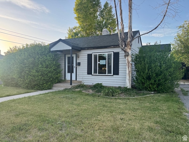 1704 W 50 N, Provo, UT 84601 - view of front of house featuring a front lawn, a chimney, and roof with shingles