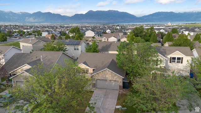 7114 N Ute Dr Unit 70, Eagle Mountain, UT 84005 - aerial view of residential area featuring a mountainous background