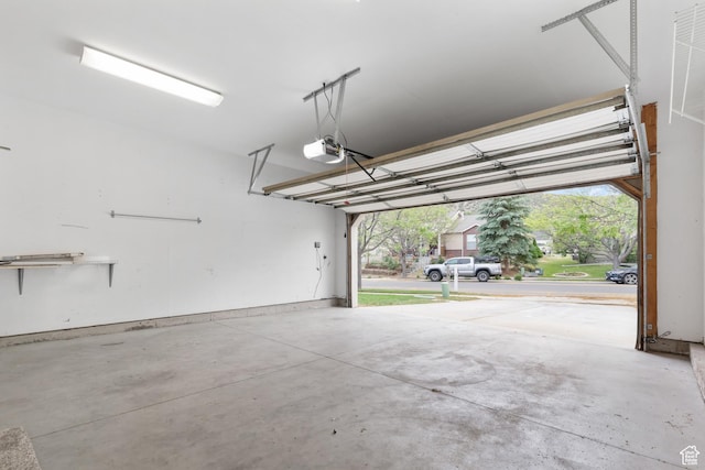 7114 N Ute Dr Unit 70, Eagle Mountain, UT 84005 - garage featuring a garage door opener