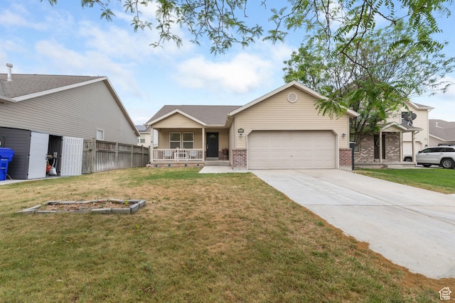 7114 N Ute Dr Unit 70, Eagle Mountain, UT 84005 - single story home featuring an attached garage, covered porch, driveway, and brick siding