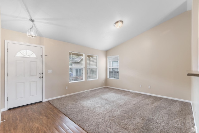 7114 N Ute Dr Unit 70, Eagle Mountain, UT 84005 - foyer entrance featuring vaulted ceiling and wood finished floors