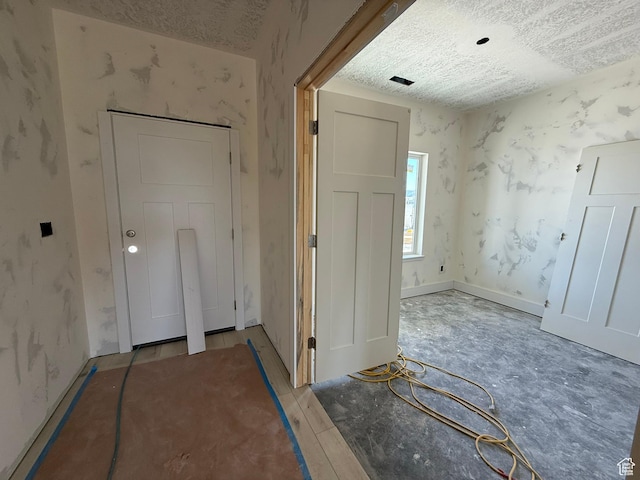 1174 W 3410 S, Nibley, UT 84321 - entryway featuring wallpapered walls and a textured ceiling