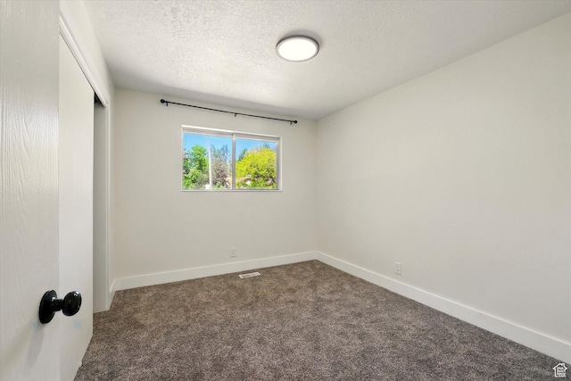 1520 N 1600 E, North Logan, UT 84341 - unfurnished bedroom featuring carpet flooring, a closet, and a textured ceiling