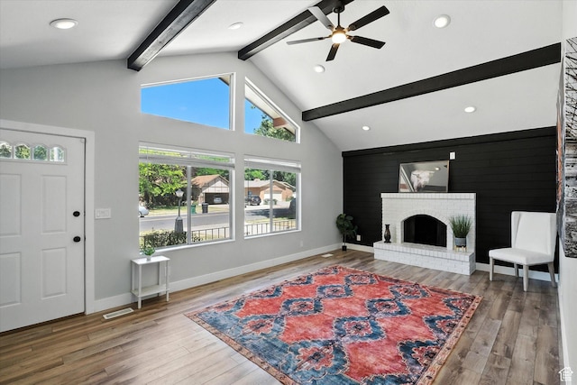 1520 N 1600 E, North Logan, UT 84341 - living room with a ceiling fan, beam ceiling, wood finished floors, a brick fireplace, and recessed lighting