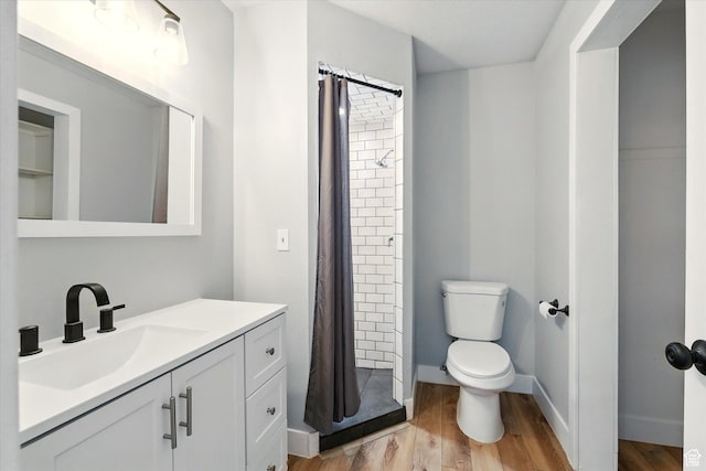 1520 N 1600 E, North Logan, UT 84341 - full bathroom featuring vanity, wood finished floors, and a stall shower
