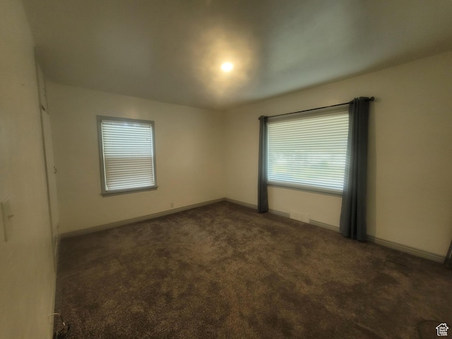 279 E 50 N, Moroni, UT 84646 - unfurnished room featuring dark colored carpet and baseboards
