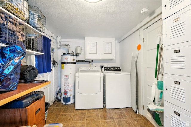 302 S 100 E, Logan, UT 84321 - washroom featuring water heater, separate washer and dryer, and a textured ceiling