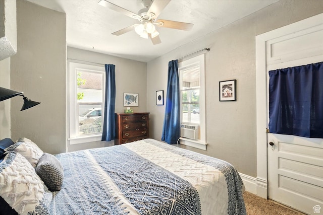 302 S 100 E, Logan, UT 84321 - carpeted bedroom featuring a ceiling fan and cooling unit