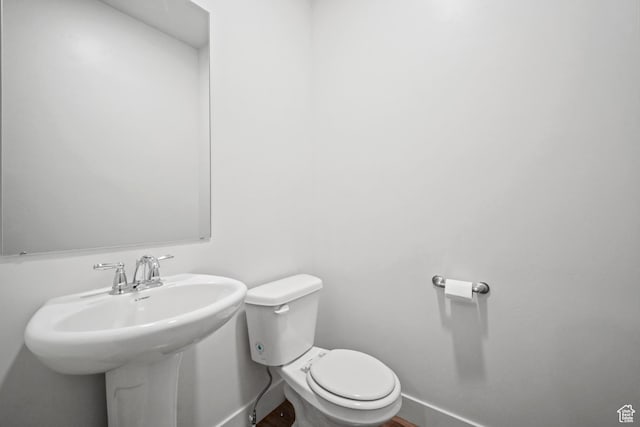 3712 E Long Ridge Dr Unit 124, Eagle Mountain, UT 84005 - half bath featuring toilet and wood finished floors