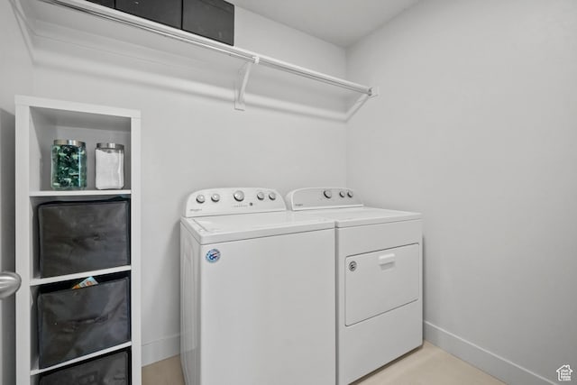 3712 E Long Ridge Dr Unit 124, Eagle Mountain, UT 84005 - laundry area with separate washer and dryer and baseboards