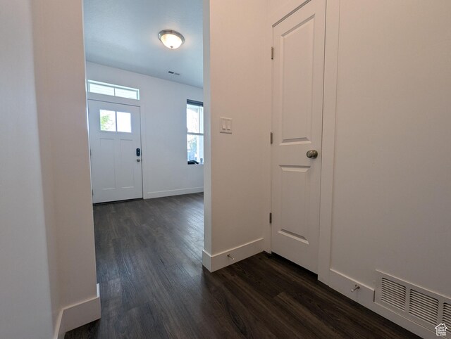 5427 W Ranches Loop Dr Unit 129, West Jordan, UT 84081 - foyer featuring dark wood-style flooring and baseboards