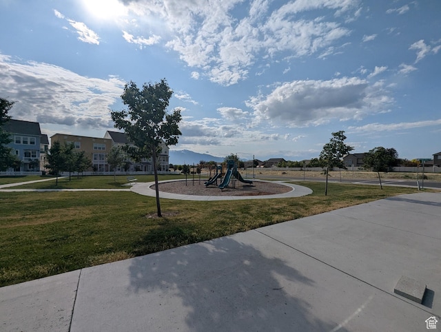 5427 W Ranches Loop Dr Unit 129, West Jordan, UT 84081 - view of community featuring a lawn