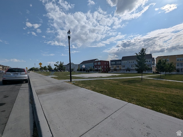 5427 W Ranches Loop Dr Unit 129, West Jordan, UT 84081 - view of street with sidewalks, street lighting, and a residential view