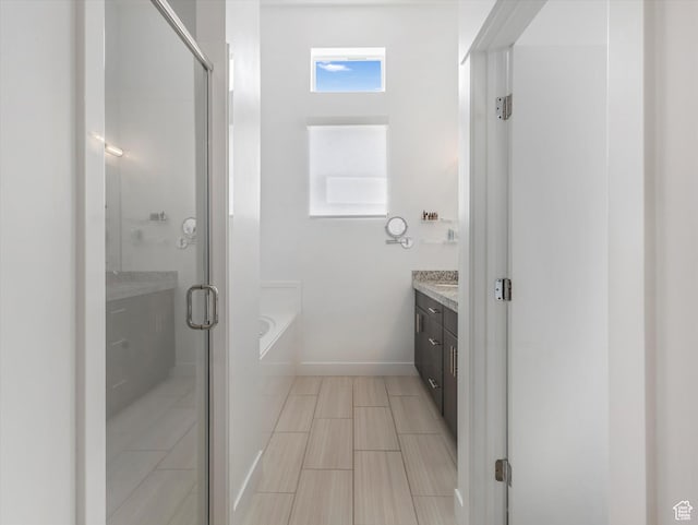 9217 S Holiday Bowl Ct E, Sandy, UT 84094 - full bath with vanity, a garden tub, and a shower stall
