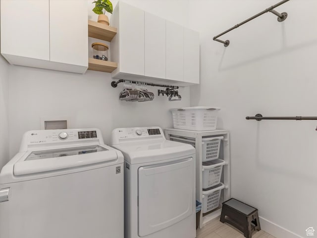 9217 S Holiday Bowl Ct E, Sandy, UT 84094 - laundry room featuring cabinet space and washer and dryer