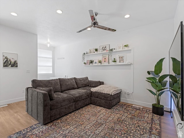 9217 S Holiday Bowl Ct E, Sandy, UT 84094 - living area with wood finished floors, a ceiling fan, and recessed lighting