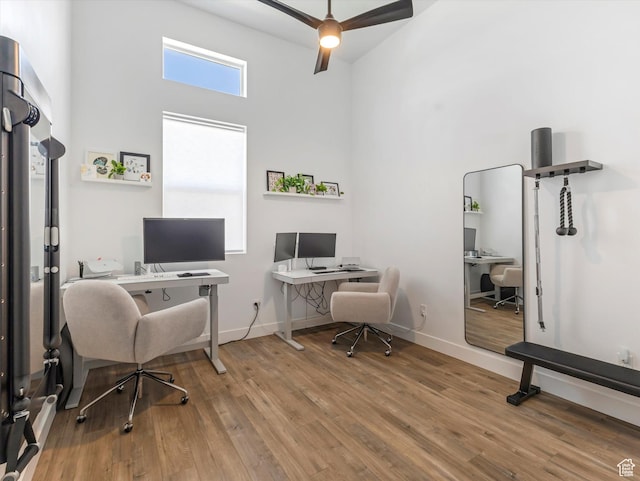 9217 S Holiday Bowl Ct E, Sandy, UT 84094 - office featuring a high ceiling, wood finished floors, and a ceiling fan