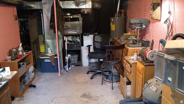 131 6th W, East Carbon, UT 84520 - office with water heater and unfinished concrete floors