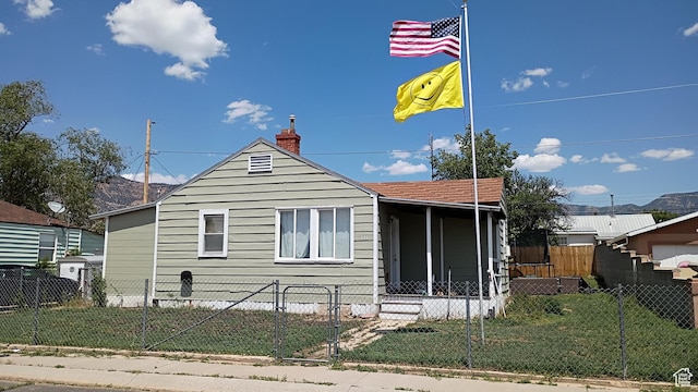 131 6th W, East Carbon, UT 84520 - view of side of property featuring a fenced front yard