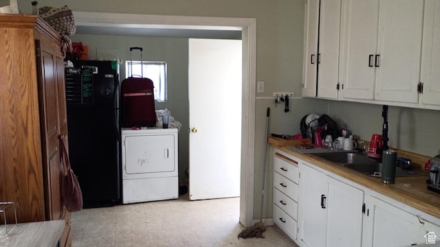 131 6th W, East Carbon, UT 84520 - washroom featuring washer / dryer and a sink