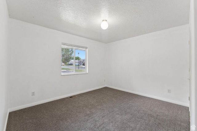 827 S 1030 W, Richfield, UT 84701 - carpeted spare room featuring a textured ceiling and baseboards