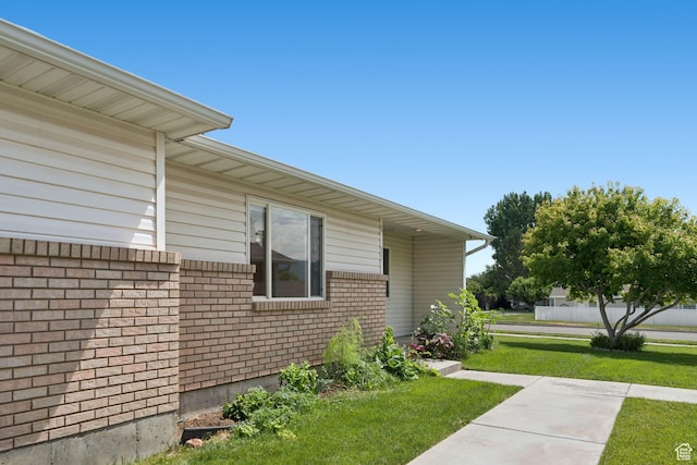 827 S 1030 W, Richfield, UT 84701 - view of side of property with a yard and brick siding
