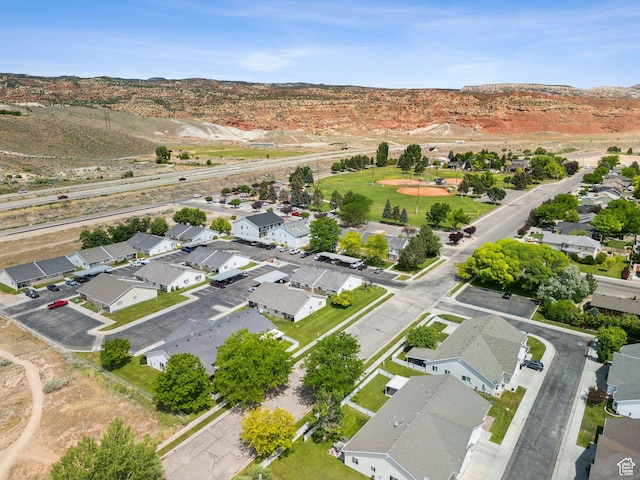 827 S 1030 W, Richfield, UT 84701 - aerial overview of property's location with nearby suburban area and a mountainous background
