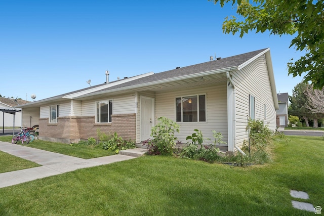 827 S 1030 W, Richfield, UT 84701 - ranch-style home with a front lawn and brick siding