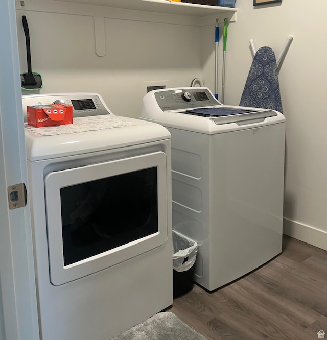 470 W 15 S Unit F201, Providence, UT 84332 - laundry area featuring washing machine and dryer and wood finished floors