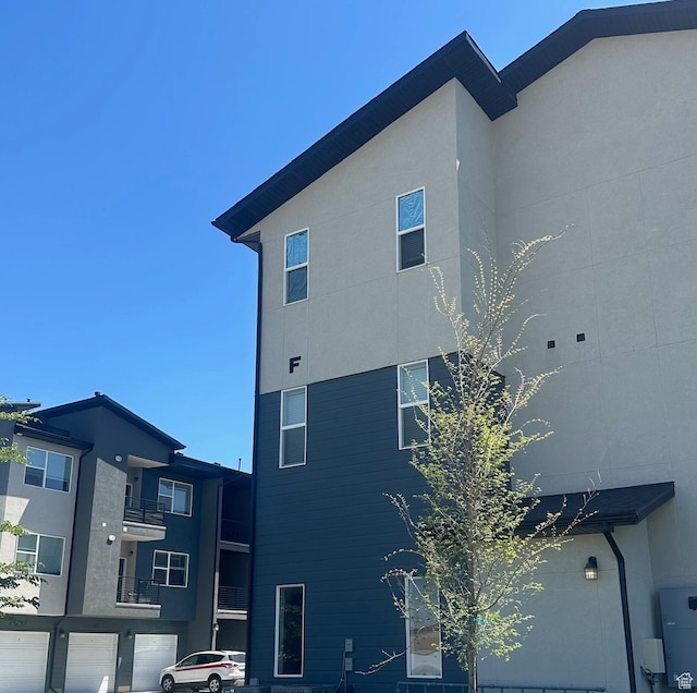 470 W 15 S Unit F201, Providence, UT 84332 - view of side of property featuring stucco siding